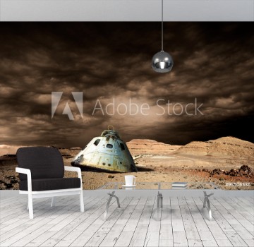 Picture of A scorched space capsule lies abandoned on a barren world - Elements of this image furnished by NASA